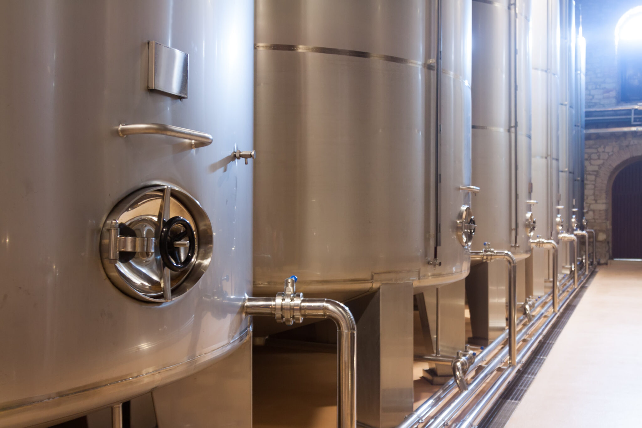 modern stell barrels in winery